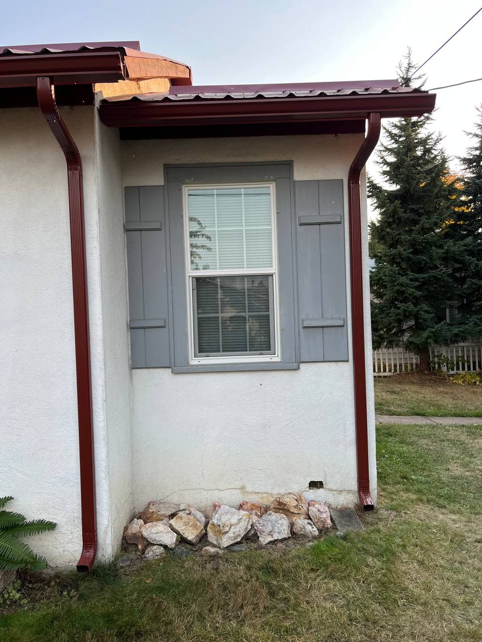 Completed seamless gutter system on home exterior