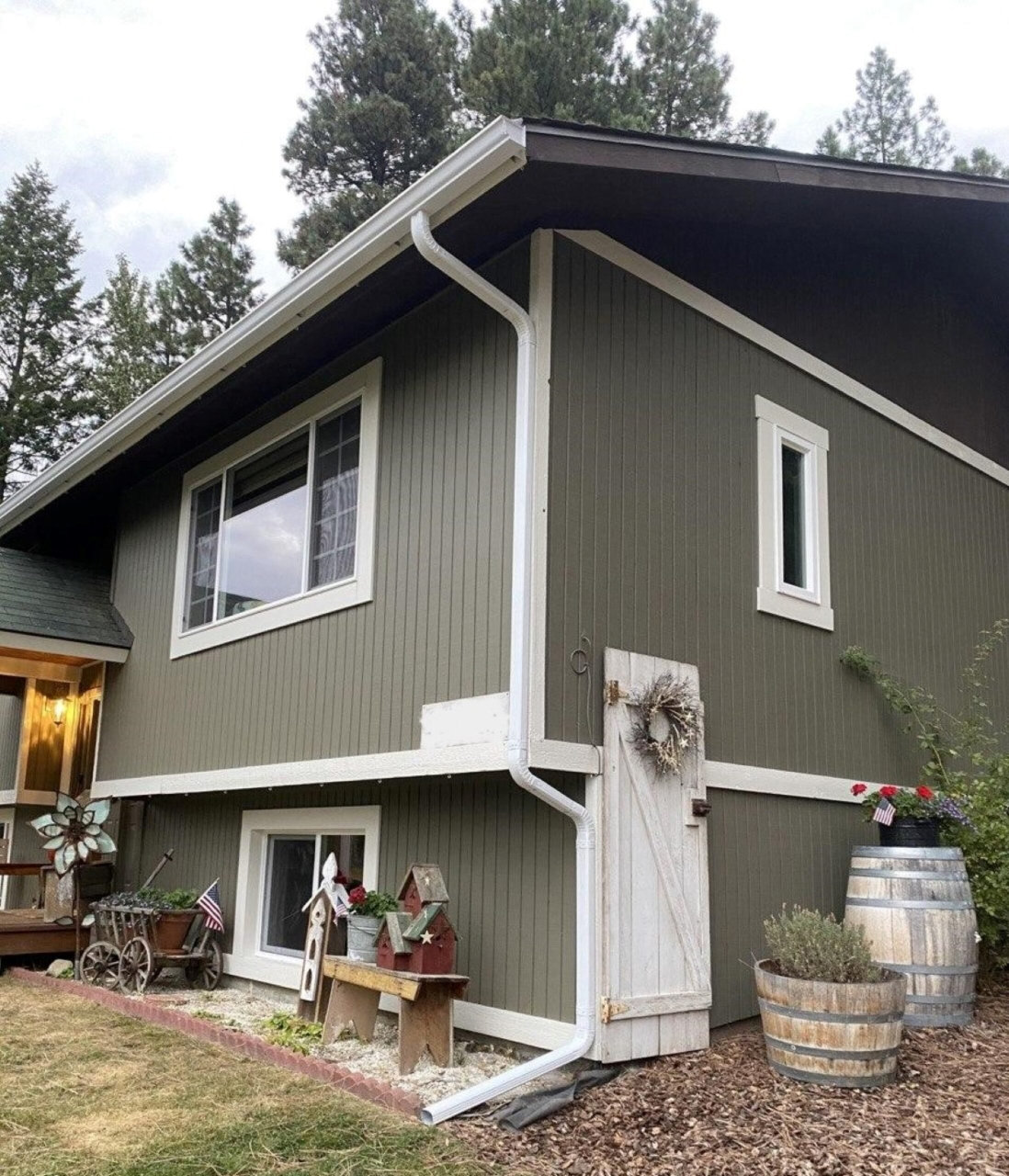 Residential seamless gutter project with downspout